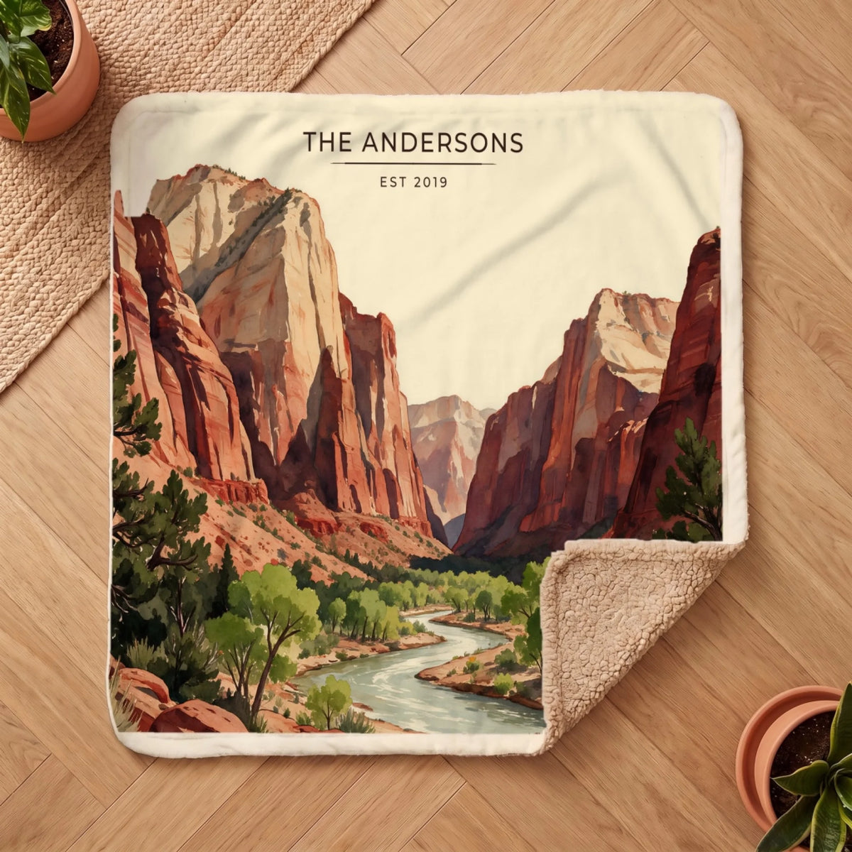 Personalized Zion Canyon River Sherpa Blanket on a wooden floor with the cozy sherpa back showing