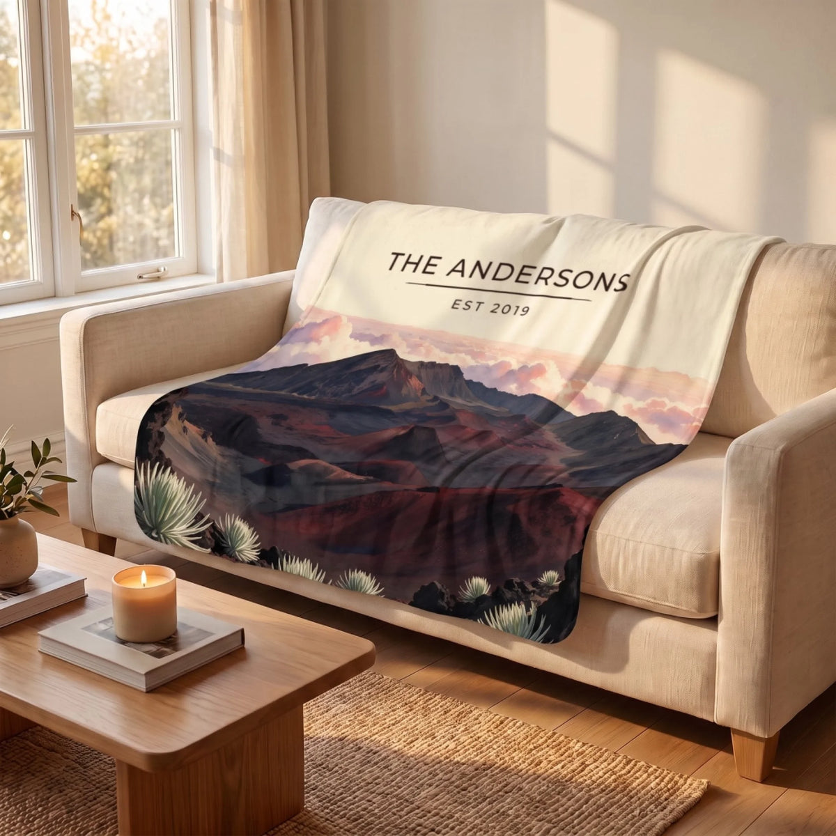 Haleakala Crater Sunrise Sherpa Blanket draped over a sofa