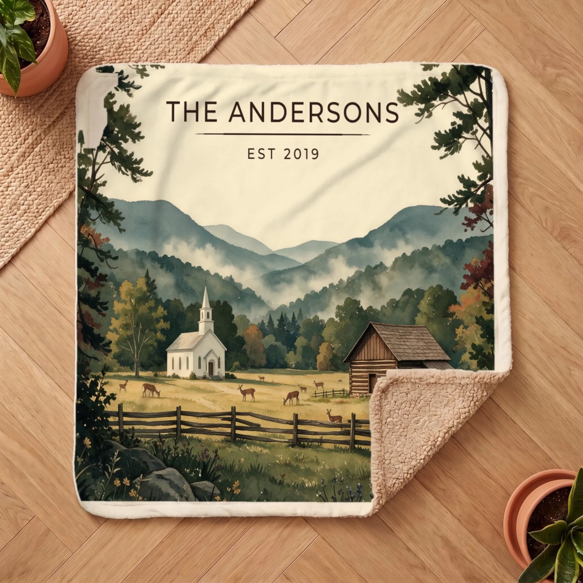Personalized Great Smoky Mountains Cades Cove Sherpa Blanket on a wooden floor with the cozy sherpa back showing