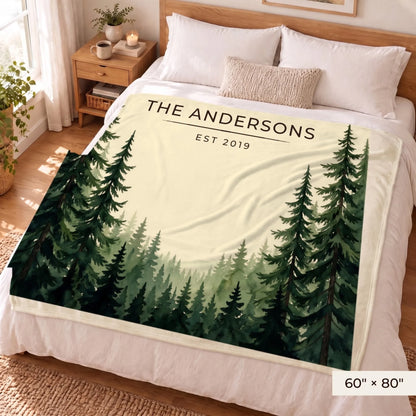 Evergreen Forest Treetops Sherpa Blanket 60x80 on a queen bed