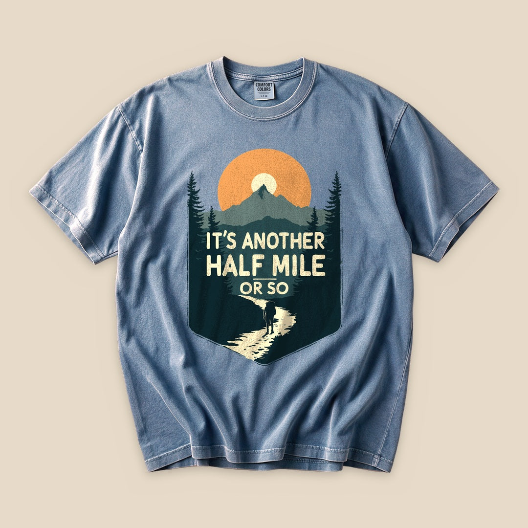 Blue Jean Half Mile T-Shirt with an It's Another Half Mile or So mountain hiker graphic