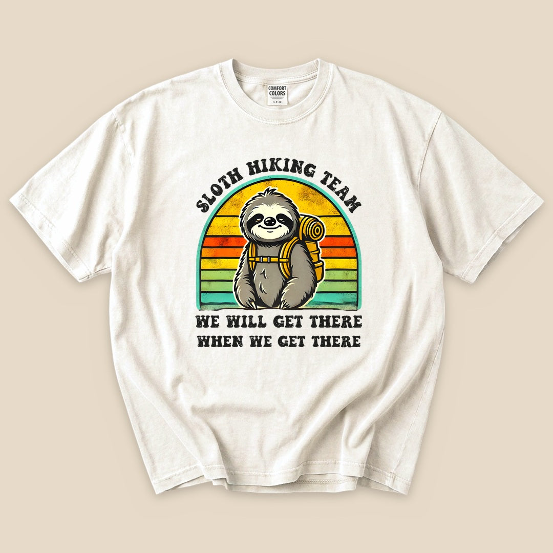 Ivory Sloth Hiking Team T-Shirt with a backpacking sloth and retro sunset stripes graphic