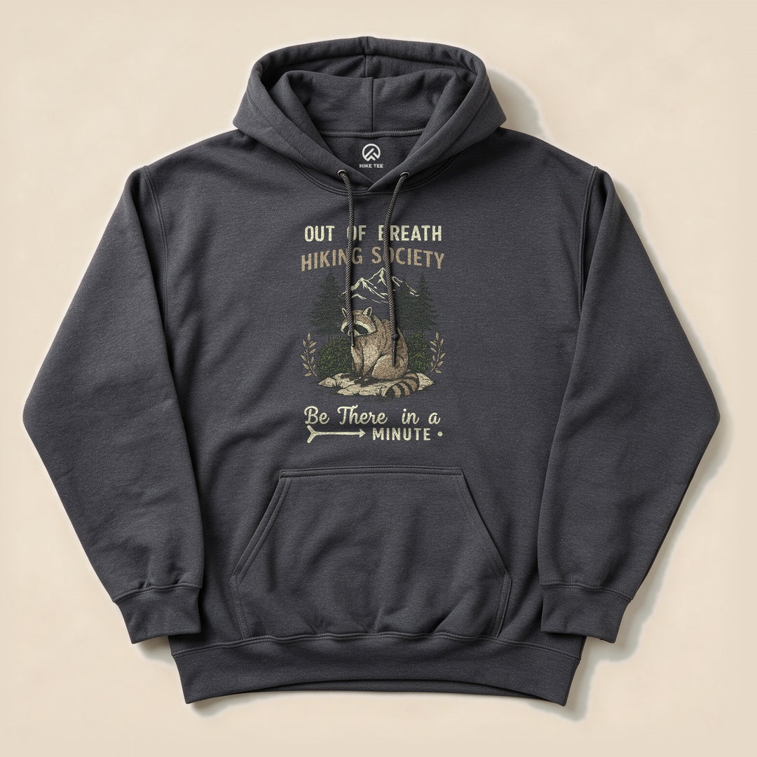 Dark Heather Out of Breath Hiking Society Raccoon Hoodie with a funny raccoon hiking graphic