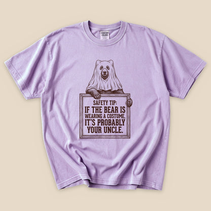 Orchid Bear Safety Tip T-Shirt with a bear in a ghost costume and a funny safety tip graphic