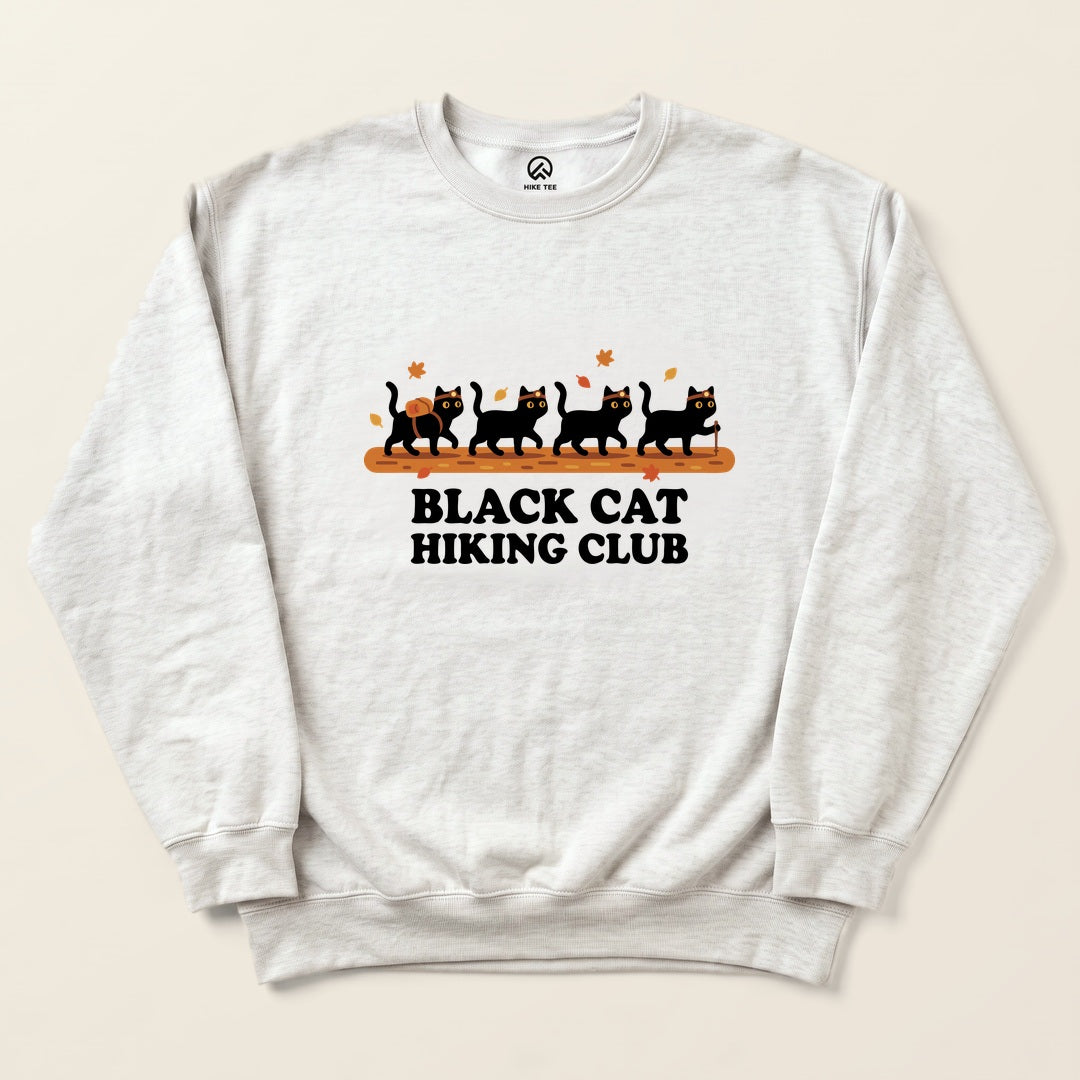 Ash Black Cat Hiking Club Sweatshirt with four black cats hiking on an autumn trail graphic