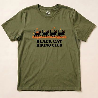 Military Green Black Cat Hiking Club Shirt with a row of black cats walking on a log with autumn leaves graphic