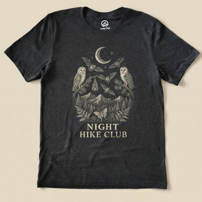 Dark Grey Heather Night Hike Club Engraved Shirt with a night forest scene with a moon, owls, moths and mountains in engraved style graphic