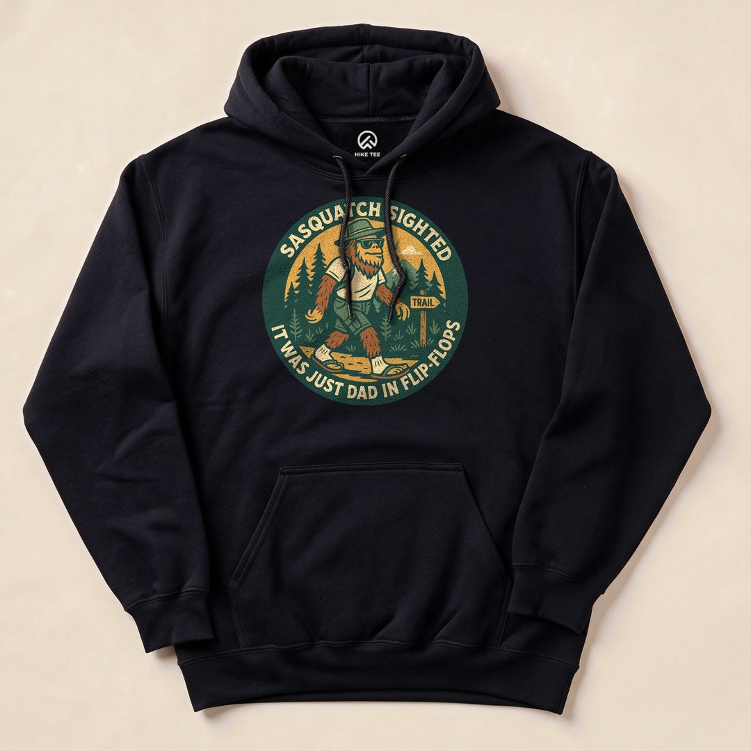 A black "Sasquatch Sighted Hoodie" features a humorous graphic of Sasquatch in flip-flops with the slogan, "It was just Dad in flip flops.