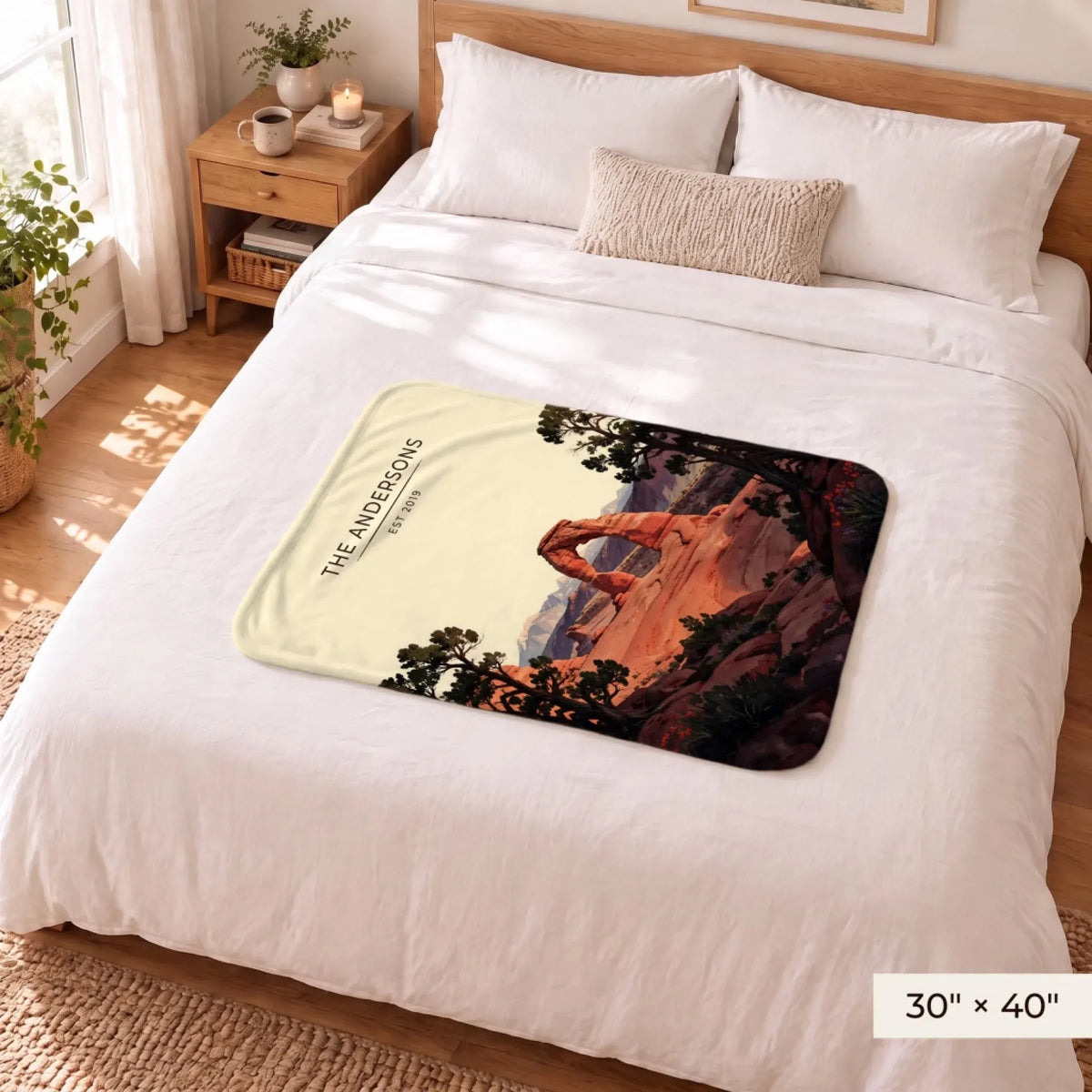 Arches Delicate Arch Sunset Sherpa Blanket 30x40 on a queen bed