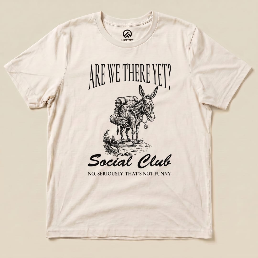 The "Are We There Social Club Shirt" features a humorous donkey illustration with hiking gear and the text, "Are We There Yet? Social Club.