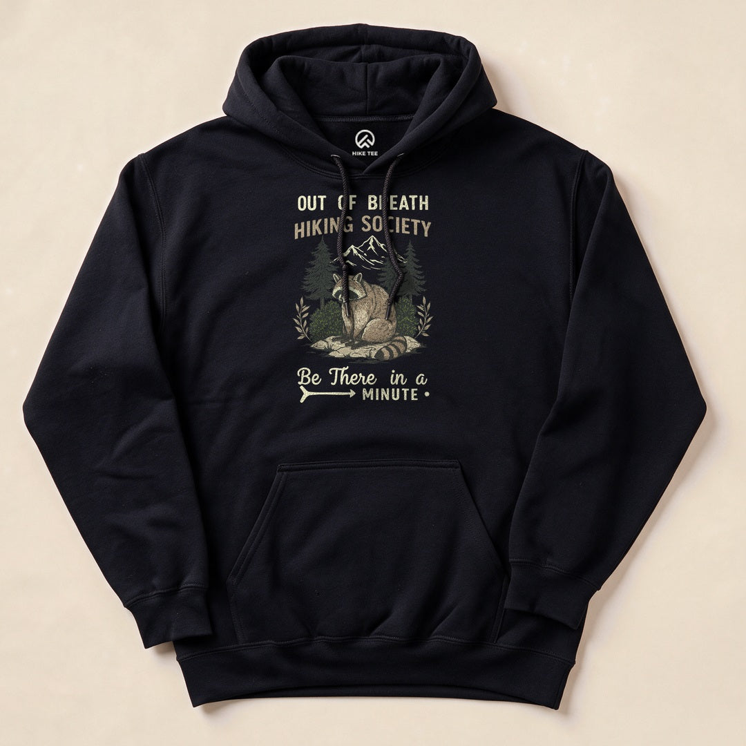 Black Out of Breath Hiking Society Raccoon Hoodie with a funny raccoon hiking graphic