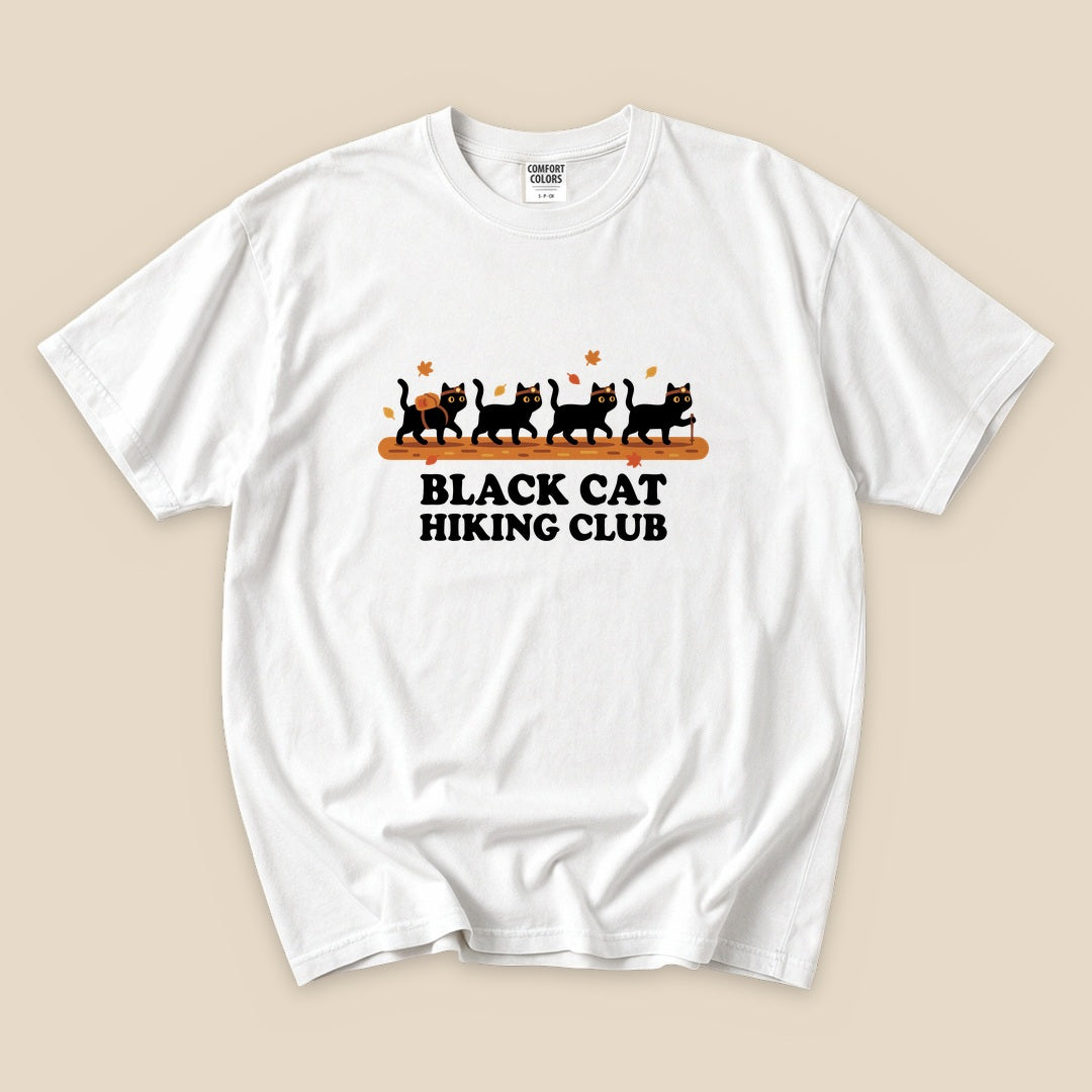 White Black Cat Hiking Club T-Shirt with black cats hiking in a row graphic