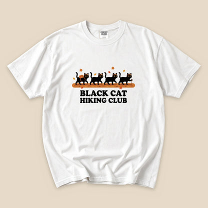 White Black Cat Hiking Club T-Shirt with black cats hiking in a row graphic