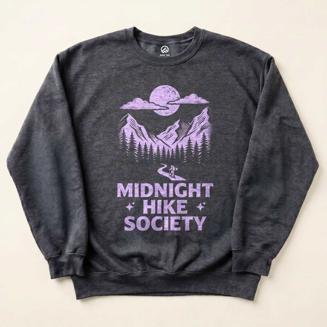 Dark Heather Midnight Hike Society Sweatshirt with a full moon over the mountains and a night hiker graphic
