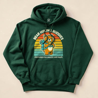 A green hoodie featuring the text "BEAR HIKING BUDDIES" and a graphic of a bear with a backpack, labeled "PREPARED FOR SNACKS AND NAPS.