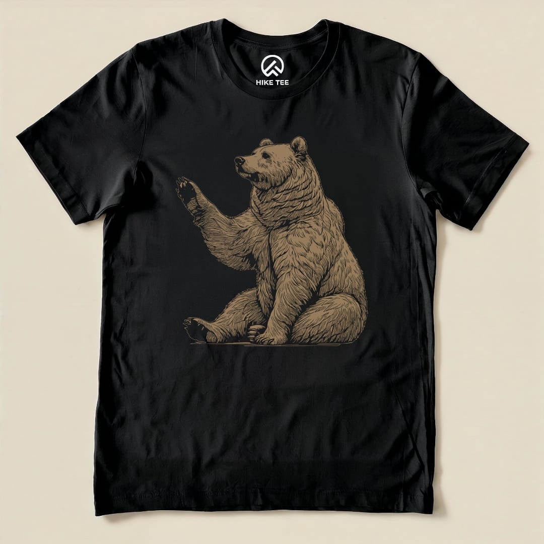 Black graphic t-shirt featuring a detailed bear illustration with the arm raised, labeled "Bear Is Watching Shirt.
