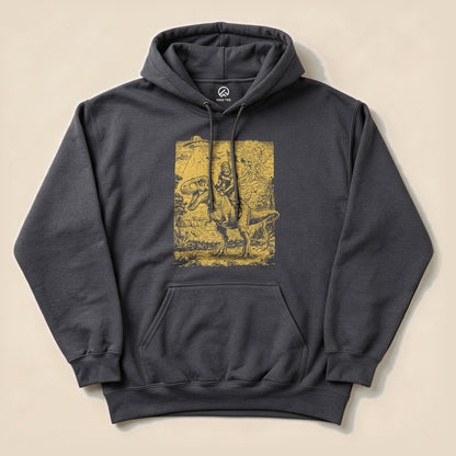A graphic hoodie features a whimsical illustration of a dinosaur with a rider, labeled as "Bigfoot Dinosaur Hoodie.