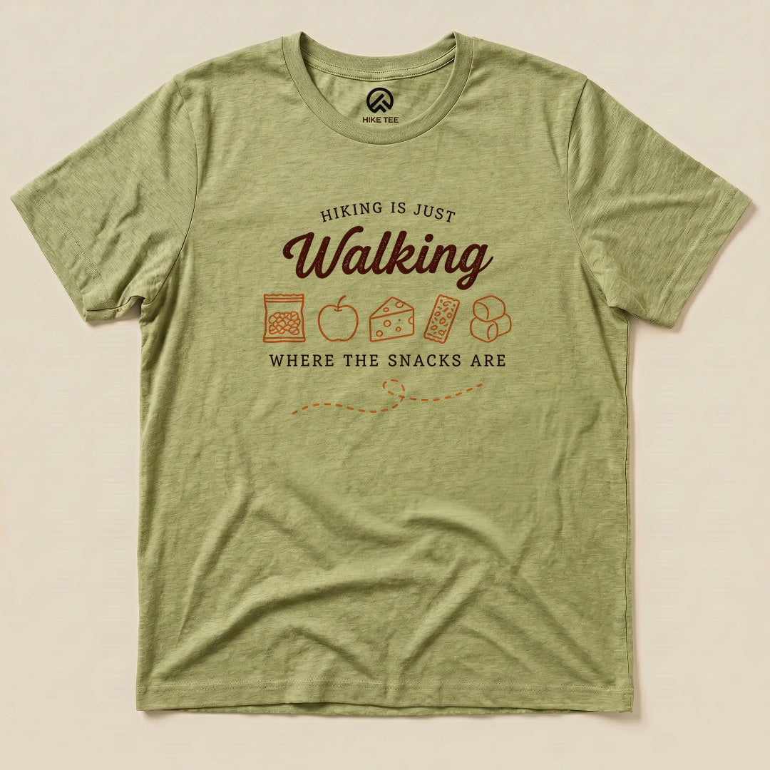 Heather Green Hiking Is Just Walking Where the Snacks Are Shirt with a trail snacks graphic
