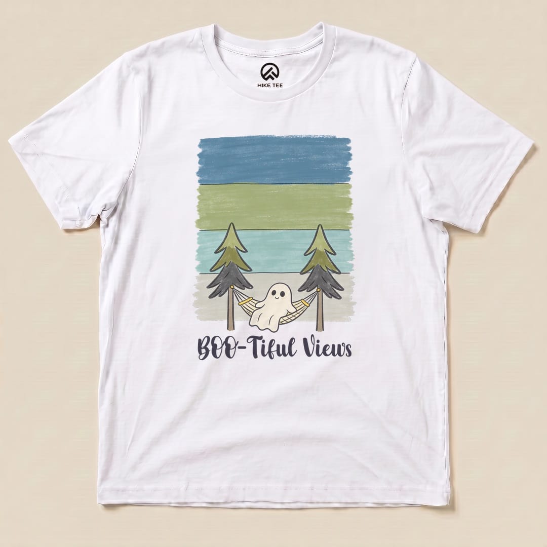 The graphic t-shirt features a whimsical design of a ghost in a hammock between trees with the text "Boo-tiful Views" underneath.