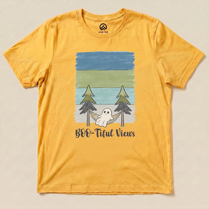 Graphic t-shirt "Boo-tiful Views Shirt" features a ghost in a hammock between trees, set against a layered landscape background.