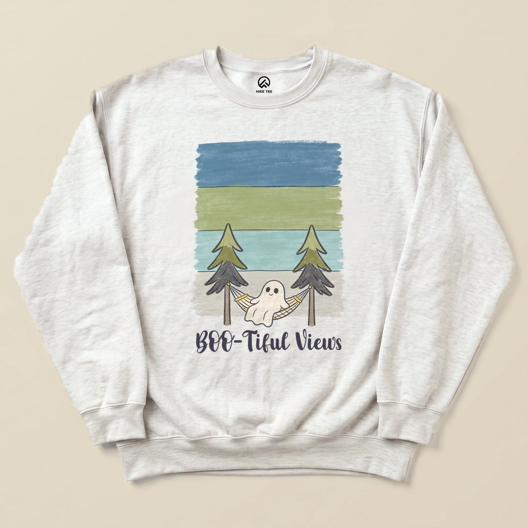 A light gray sweatshirt featuring a playful graphic of a ghost in a hammock with the text "Boo-tiful Views" below.