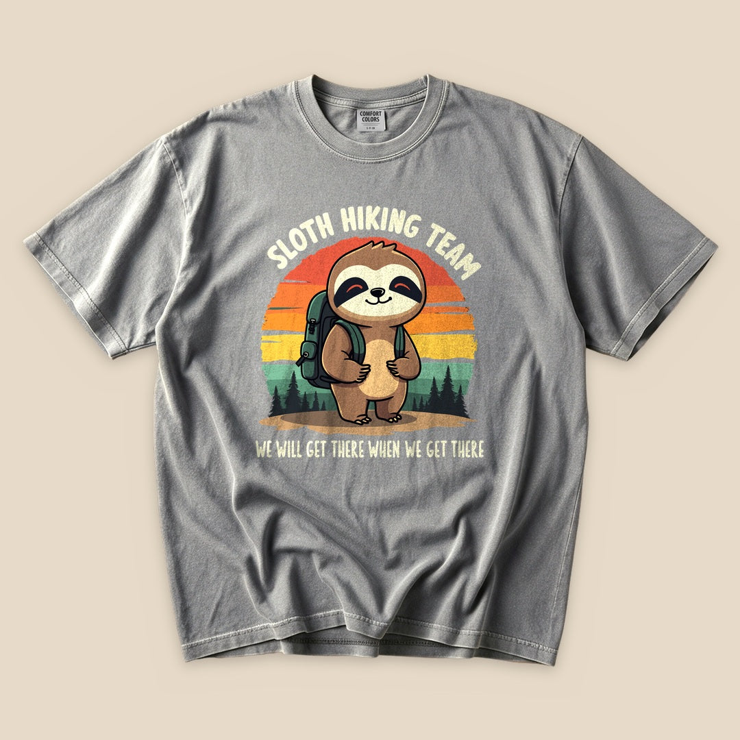 Grey Sloth Hiking Team T-Shirt with a hiking sloth and retro forest sunset graphic