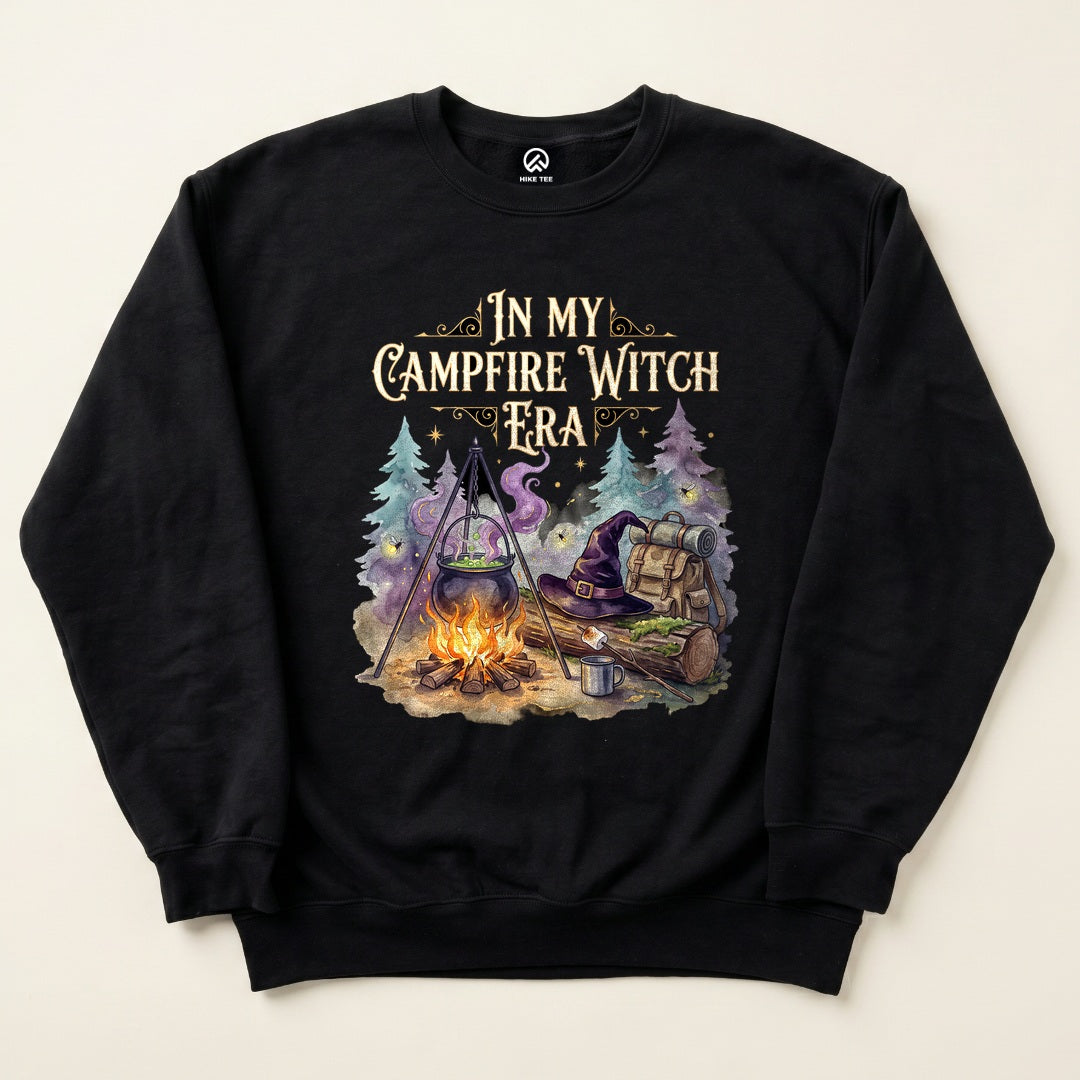 Black In My Campfire Witch Era Sweatshirt with a witch's cauldron over a campfire with a witch hat and backpack graphic