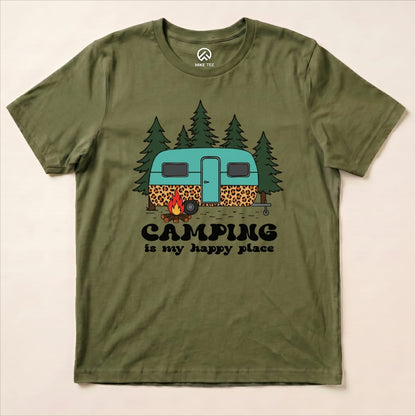 The "Camping is My Happy Place Shirt" features a vintage camper surrounded by trees and a campfire in a playful design.