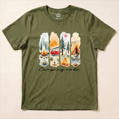 A Camping mode Watercolor Shirt featuring a vibrant camping scene with a red van, tents, a campfire, and trees.