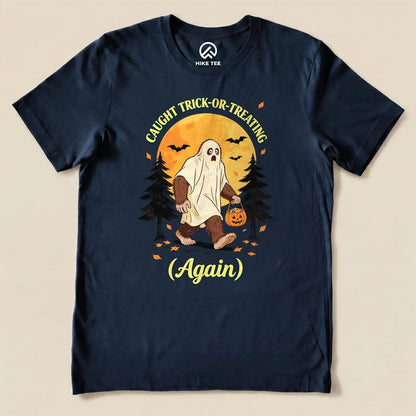 Navy Caught Trick-or-Treating Again Shirt with a Bigfoot in a ghost sheet trick-or-treating graphic
