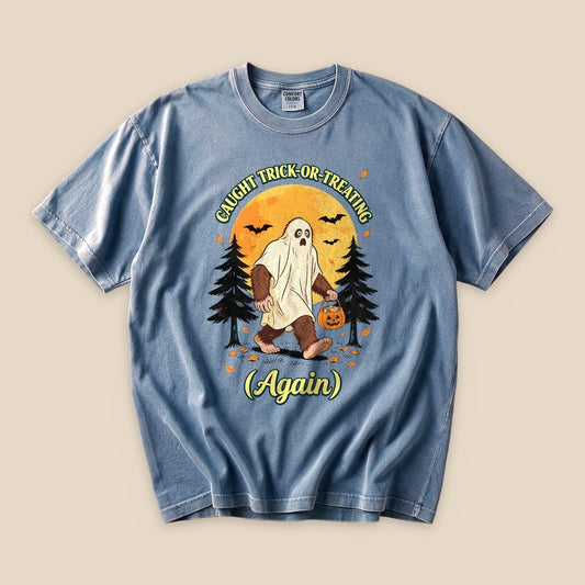 Blue Jean Caught Trick-or-Treating Again T-Shirt with a Bigfoot in a ghost sheet trick-or-treating graphic