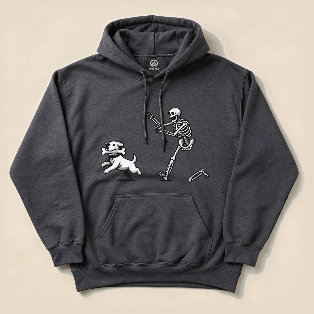 A graphic t-shirt features a playful design of a skeleton running alongside a dog, titled "Skeleton and Dog Hoodie.