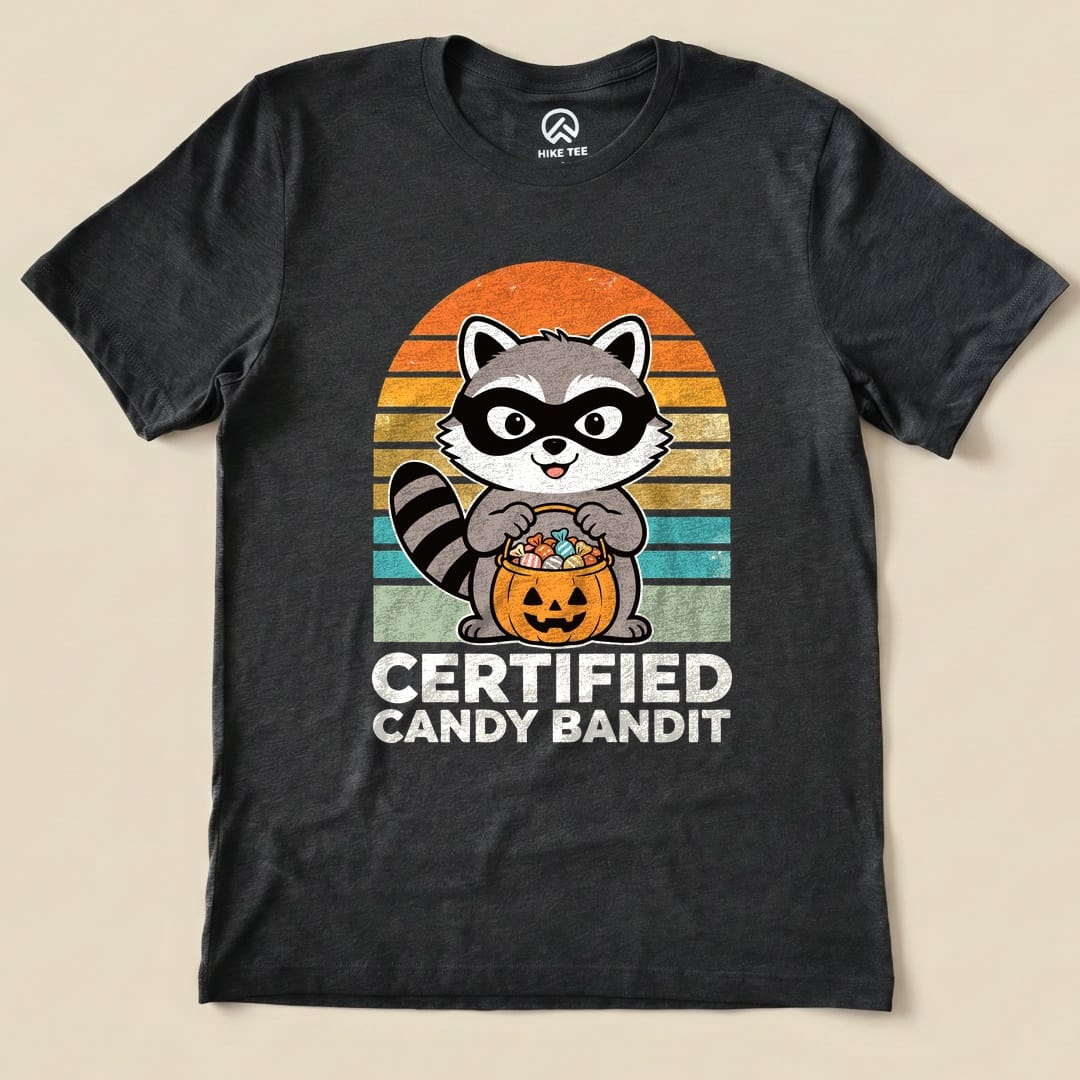 Dark Grey Heather Certified Candy Bandit Shirt with a masked raccoon holding a pumpkin candy bucket graphic