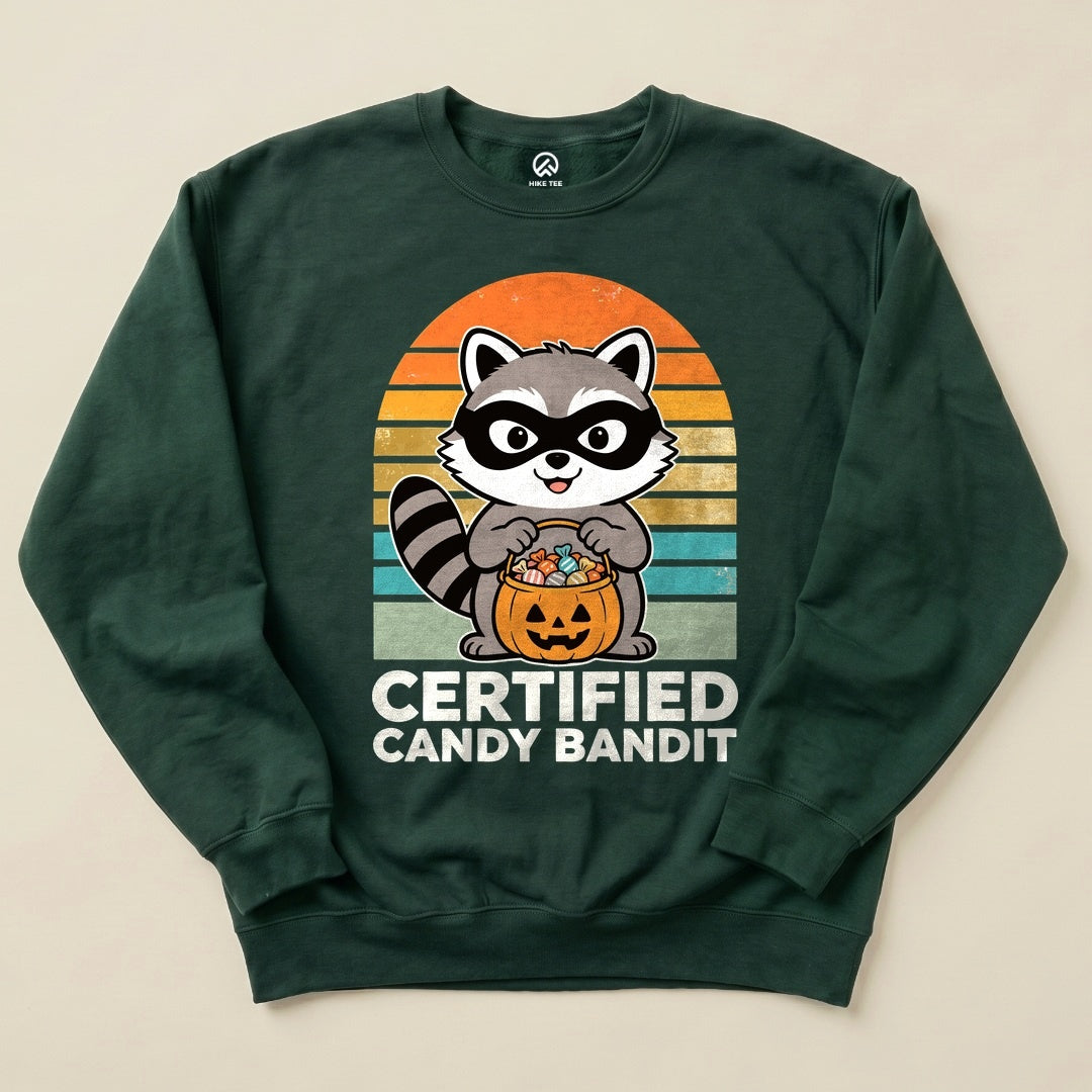 Forest Green Certified Candy Bandit Sweatshirt with a masked raccoon holding a pumpkin candy bucket graphic