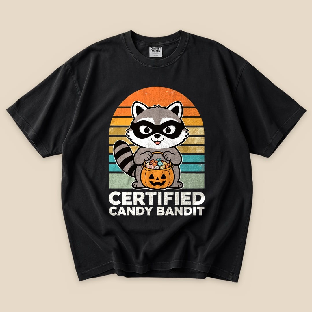 The black graphic t-shirt features a raccoon holding a pumpkin full of candy, with the words "Certified Candy Bandit" prominently displayed.