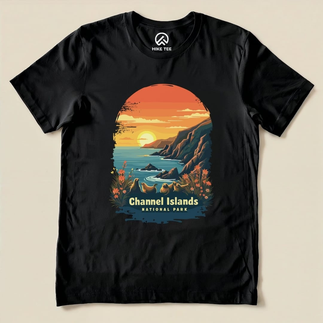 A graphic t-shirt featuring the "Channel Islands National Park Shirt" design with a sunset over the coastline and flowers.