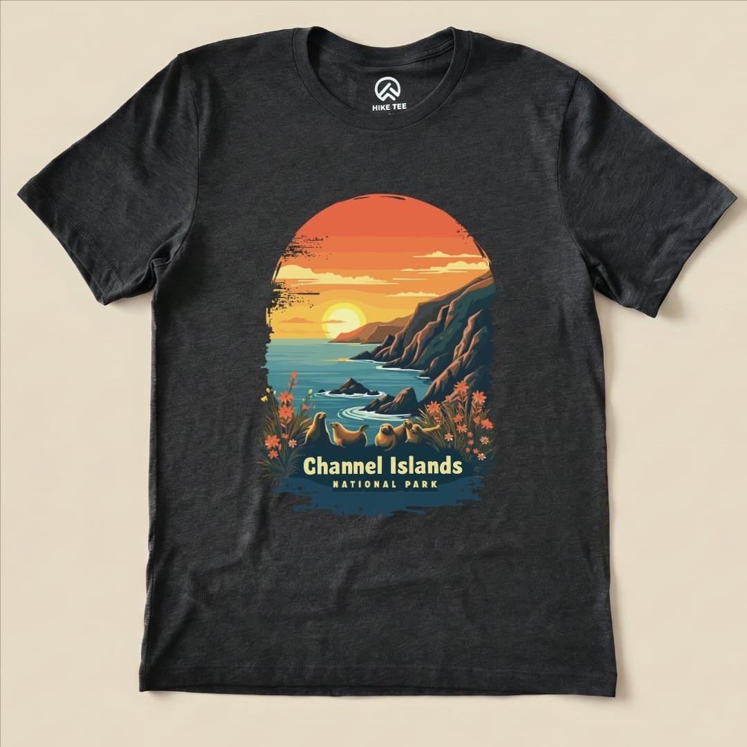 The graphic t-shirt features a vibrant sunset over the ocean with stylized cliffs and flowers, labeled "Channel Islands National Park.