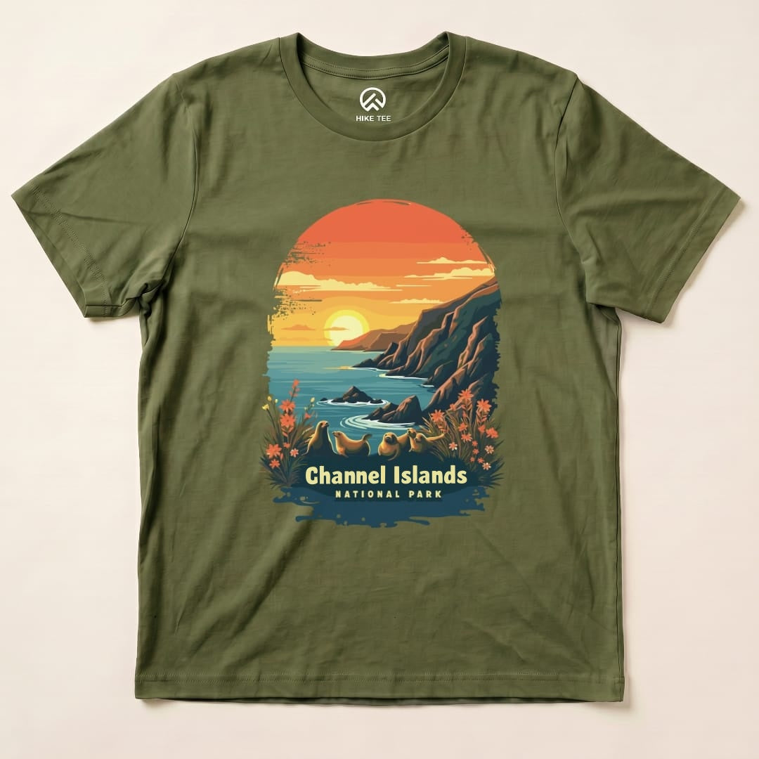 A graphic t-shirt featuring a sunset over the coast with the text "Channel Islands National Park" and vibrant floral elements.