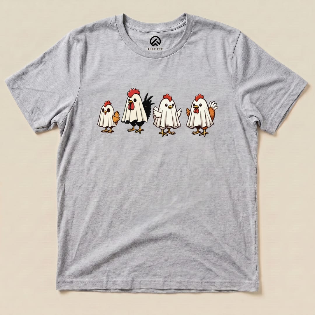 The Chicken Ghost Shirt features four cartoon chickens dressed as ghosts on a light gray graphic t-shirt.