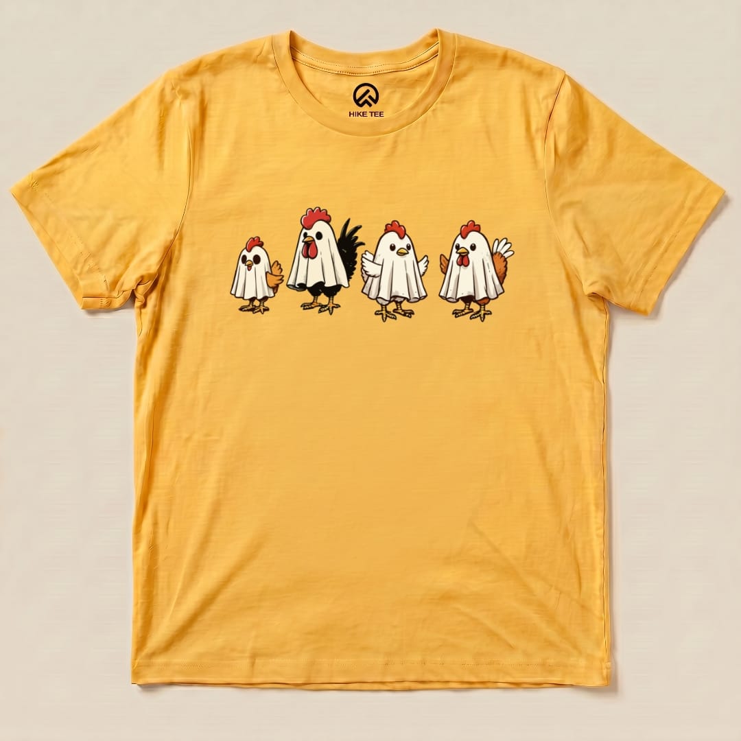 The Chicken Ghost Shirt features four cartoon chickens wearing ghost costumes against a vibrant yellow background.