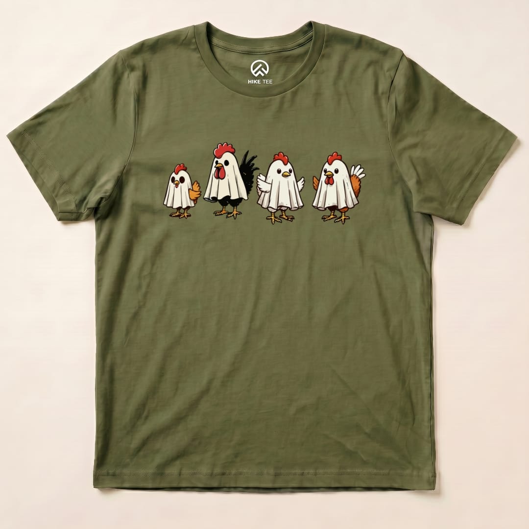 The Chicken Ghost Shirt features a fun graphic of four chickens wearing ghost costumes on an olive green graphic t-shirt.