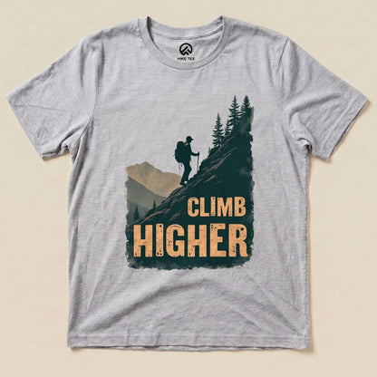 Athletic Heather Climb Higher Shirt with a hiker climbing a mountain graphic