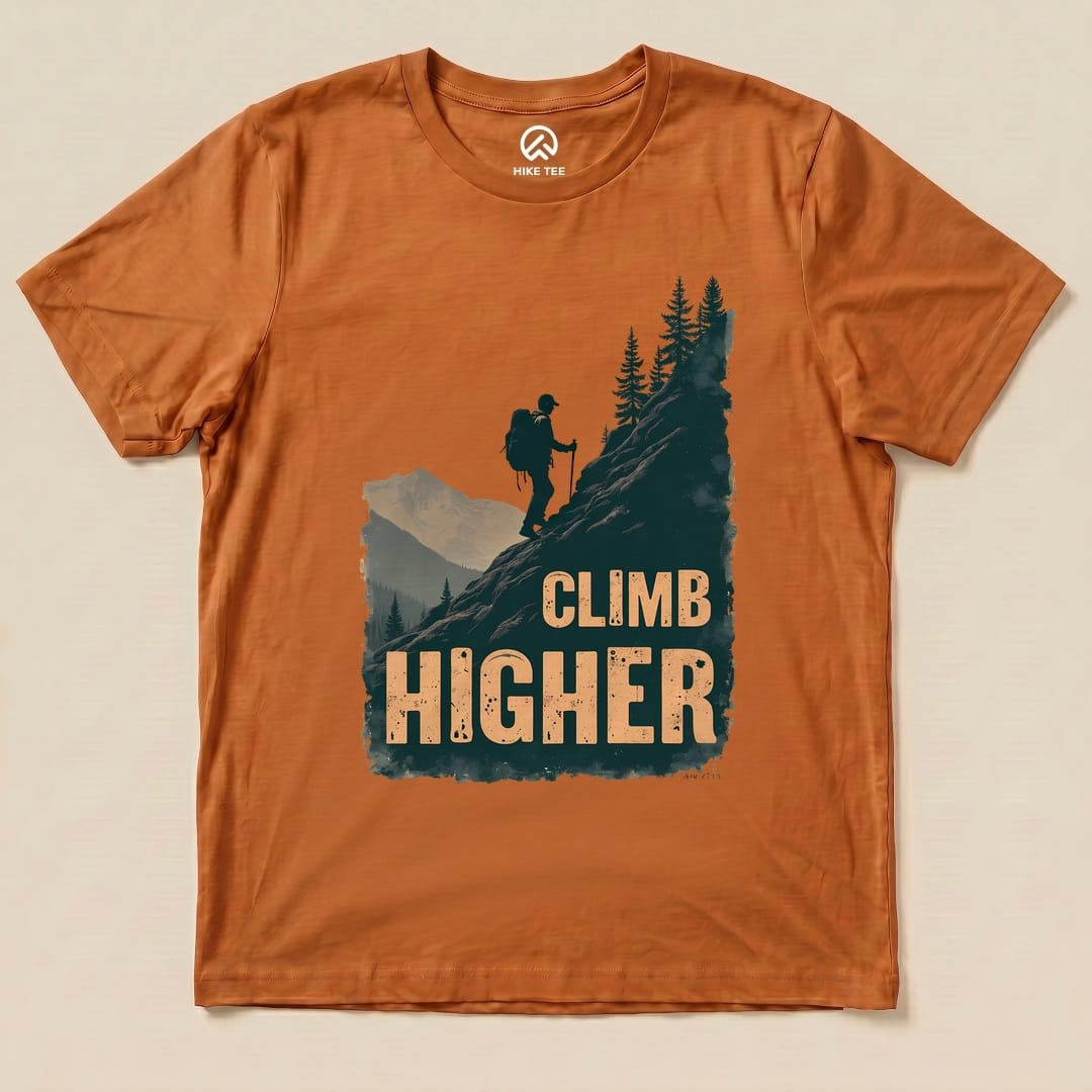Autumn Climb Higher Shirt with a hiker climbing a mountain graphic