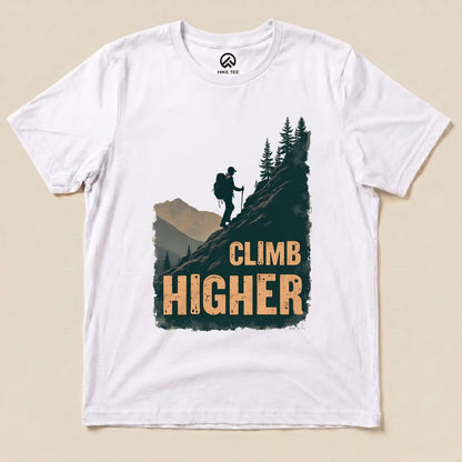 White Climb Higher Shirt with a hiker climbing a mountain graphic