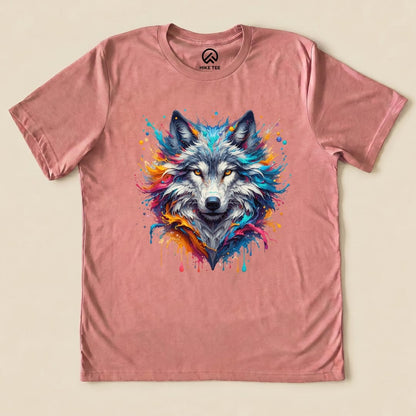 A colorful wolf graphic adorns this pink graphic t-shirt from Hike Tee, showcasing vibrant splashes of blue, orange, and pink.