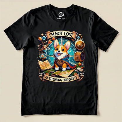The Corgi I'm Not Lost Shirt features a playful corgi in a cape with a map and compass, surrounded by adventure-themed graphics.