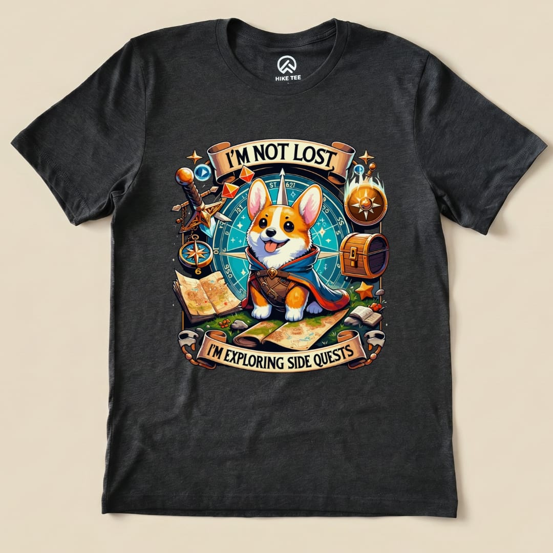 A graphic t-shirt featuring a cute corgi wearing a cape with the text "I'M NOT LOST, I'M EXPLORING SIDE QUESTS.