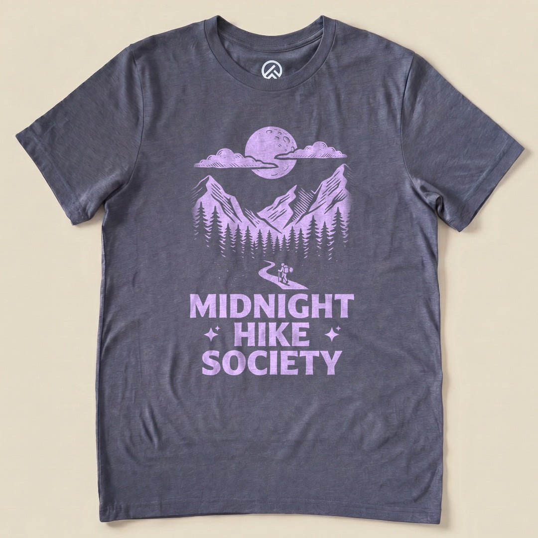 Heather Navy Midnight Hike Society Shirt with a moonlit mountain scene with a night hiker graphic