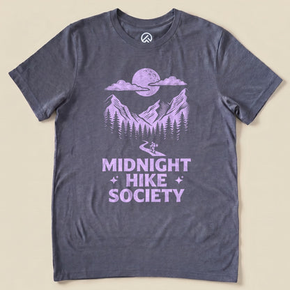 Heather Navy Midnight Hike Society Shirt with a moonlit mountain scene with a night hiker graphic