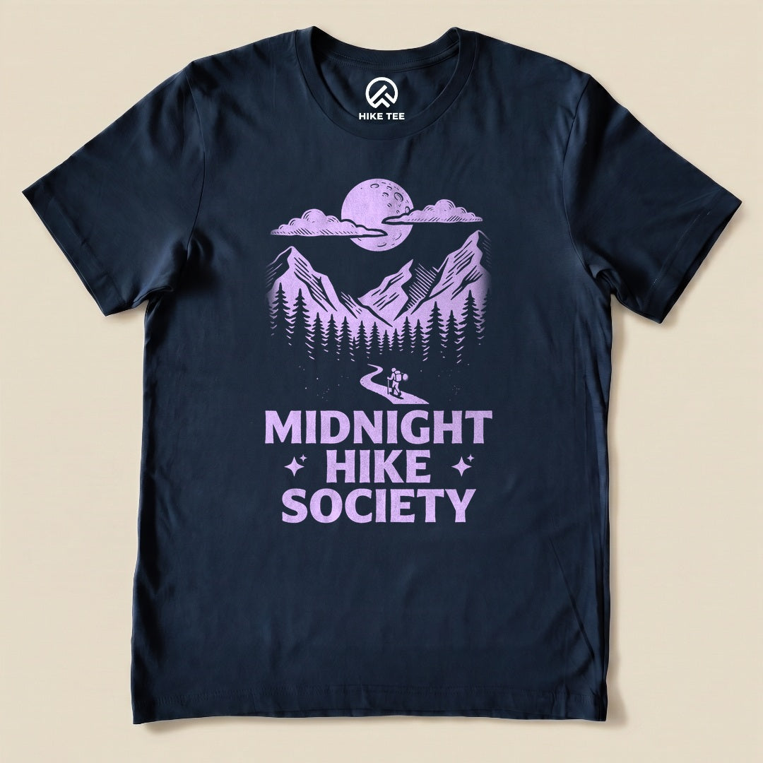 Navy Midnight Hike Society Shirt with a moonlit mountain scene with a night hiker graphic